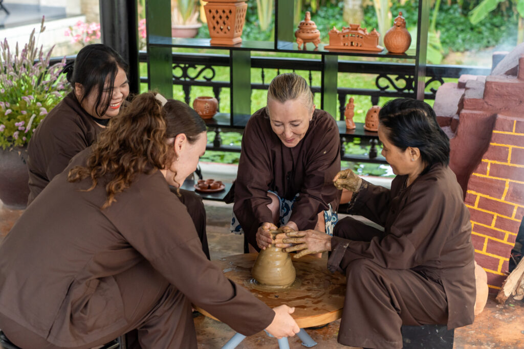 Guests can experience shaping pottery alongside artisan Thanh Ha.